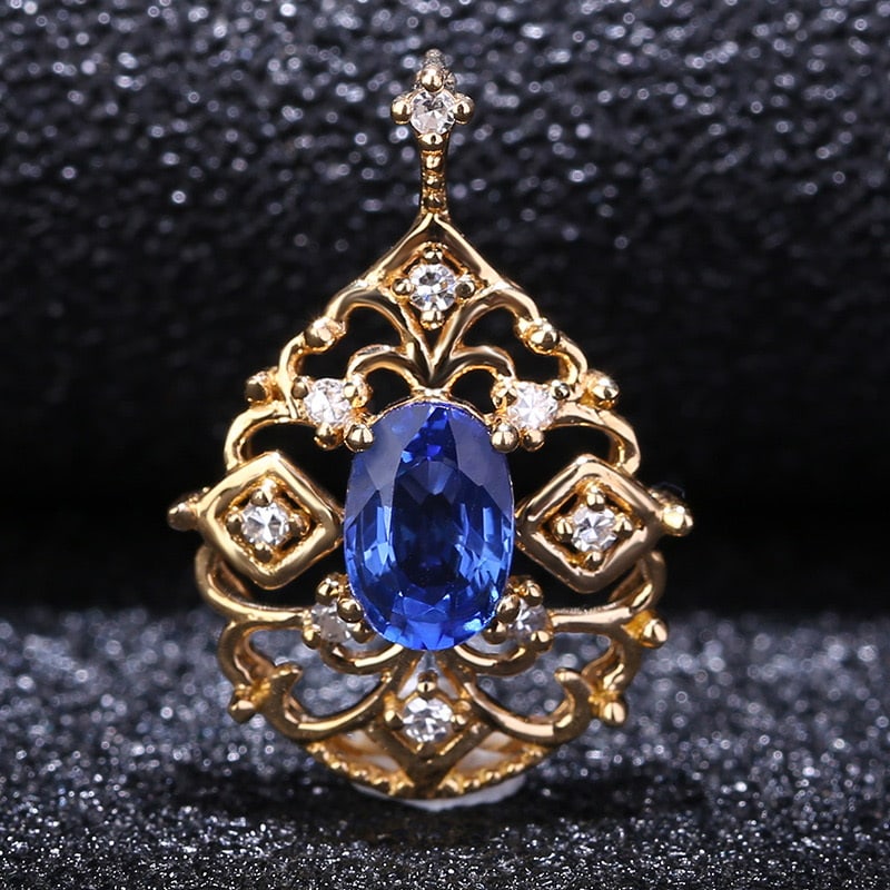 14k Gold 0.58 Ct Natural Sapphire & Diamond Pendant( Without Chain ): Ref:231032019 // gold content:14k gold // main gemstone:sapphire // shape:oval // carat weight:0. 58ct // color:blue // treatment:natural // // adjacent gemstone 2 : diamond // shape:round // clarity 