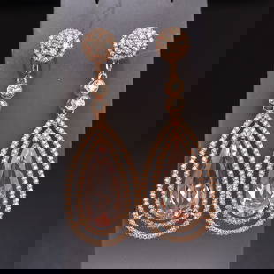 14k Gold 7.31 Ctw Natural Morganite & Diamond Earrings: Ref:230798206 // gold content:14k gold // main gemstone:morganite // number of stones:2 // shape:pear // carat weight:6. 1ct // color:pink // treatment:natural // // adjacent gemstone 2 : diamond // s