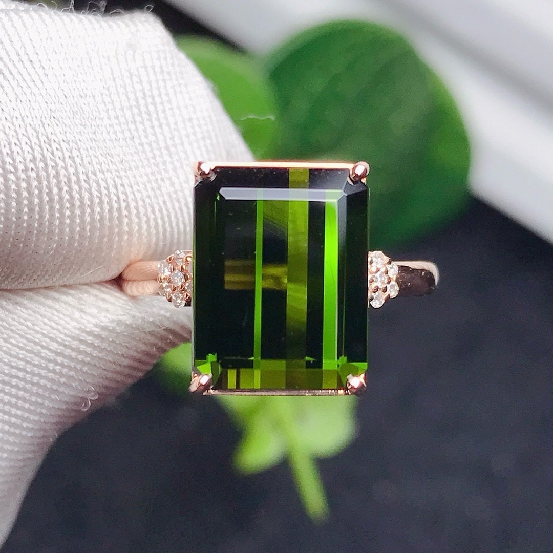 14k Gold 5.95 Ct Natural Tourmaline & Diamond Ring: Ref:230807132 // gold content:14k gold // ring size:7. 25us // // main gemstone:tourmaline // shape:octagonal // carat weight:5. 95ct // color:green // treatment:natural // // adjacent gemstone 2 : di