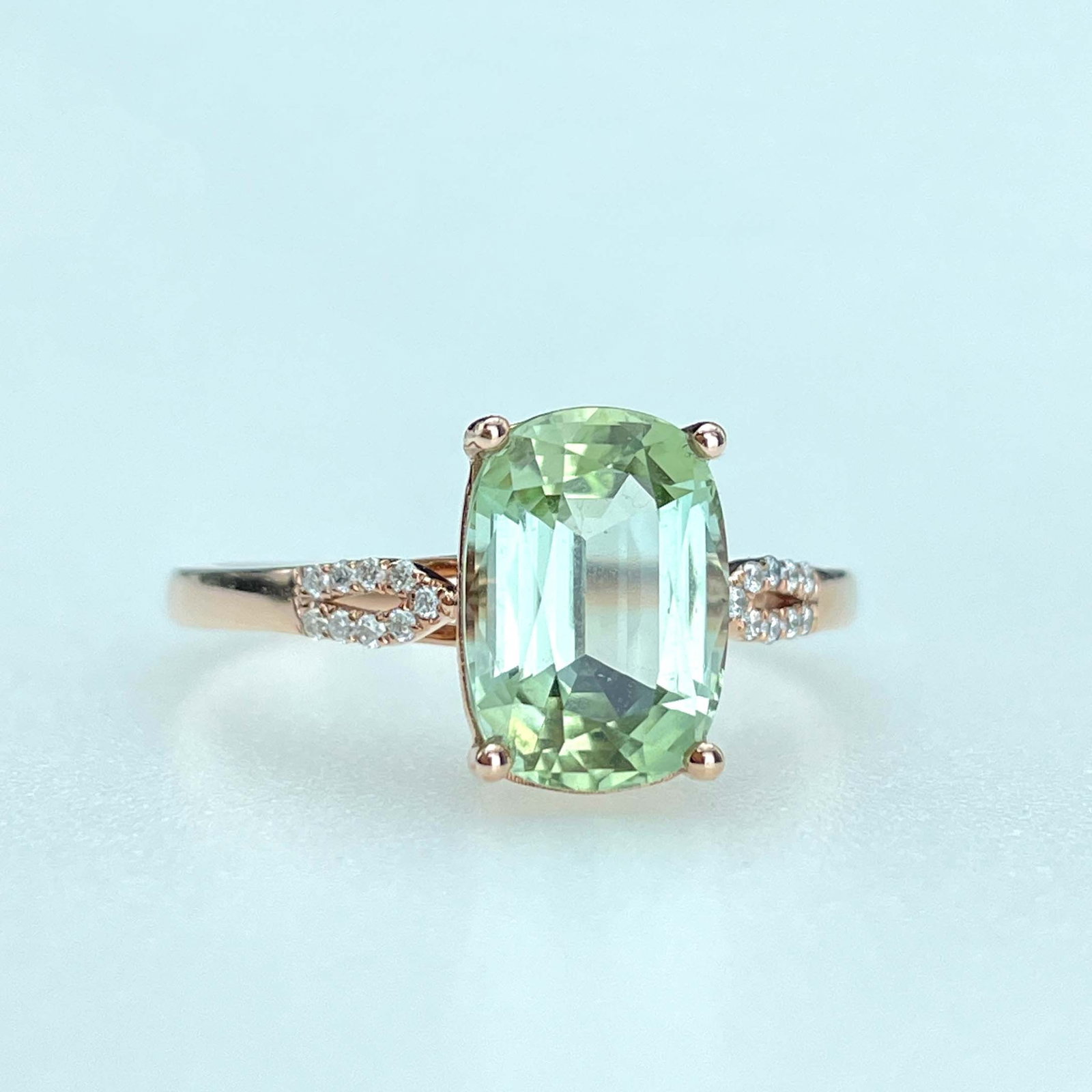 14k Gold 2.45 Ctw Natural Tourmaline & Diamond Ring: Ref:230961045 // gold content:14k gold // ring size:7. 25us // // main gemstone:tourmaline // shape:oval // carat weight:2. 4ct // color:green // treatment:natural // // adjacent gemstone 2 : diamond 