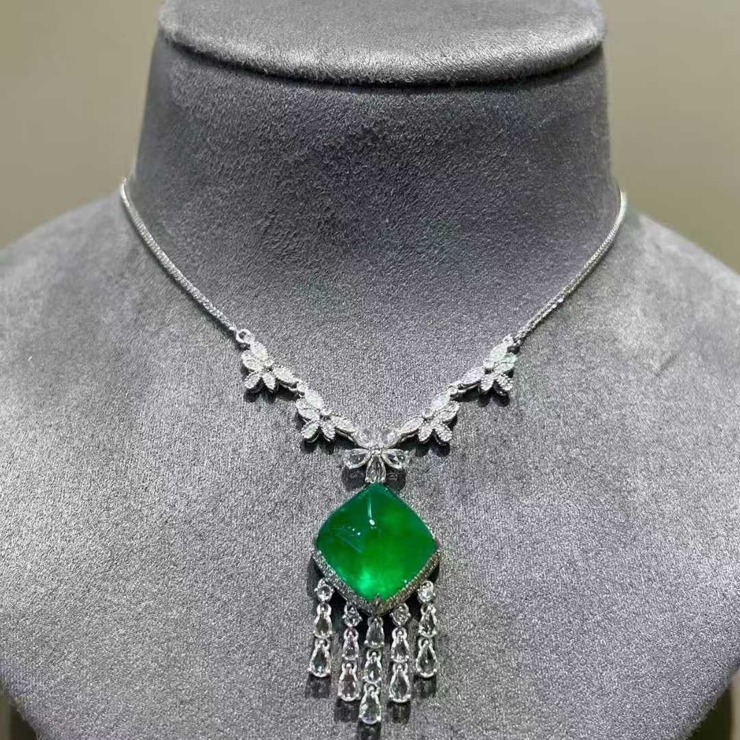 14k Gold 8.68 Ct Vivid Green Natural Emerald & Diamond & Sapphire Necklace: Ref:231089024 // gold content:14k gold // main gemstone:emerald // shape:sugar-loaf // carat weight:8. 68ct // color:vivid green // treatment:natural // // adjacent gemstone 2 : diamond //