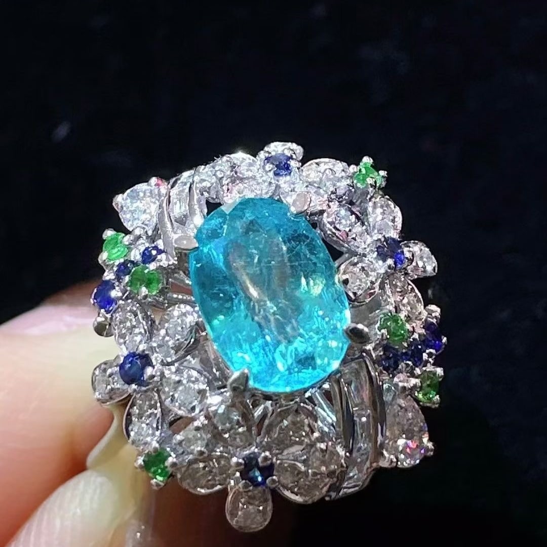 14k Gold 1.20 Ctw Natural Paraiba Tourmaline & Diamond Ring: Ref:231089085 // gold content:14k gold // ring size:7. 25us // // main gemstone:paraiba tourmaline // shape:oval // carat weight:0. 92ct // color:blue // treatment:natural // // adjacent gemstone 2 :