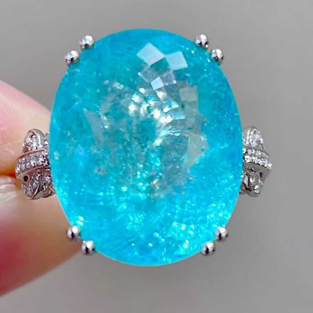 14k Gold 14.13 Ctw Natural Paraiba Tourmaline & Diamond Ring: Ref:231089122 // gold content:14k gold // ring size:7. 25us // // main gemstone:paraiba tourmaline // shape:oval // carat weight:13. 78ct // color:blue // treatment:natural // // adjacent gemstone 2 :