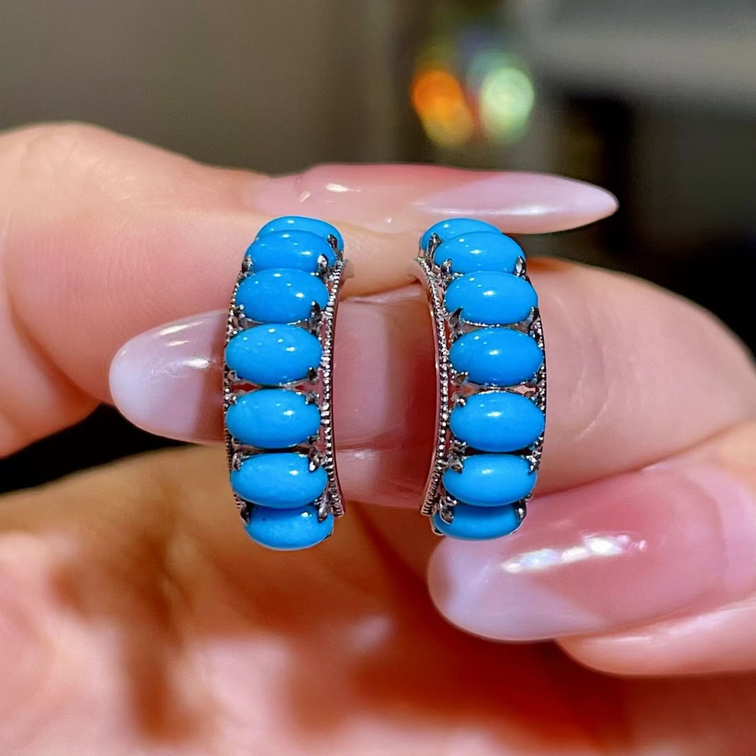 14k Gold 2.58 Ct Natural Blue Turquoise Earrings: Ref:231089165 // gold content:14k gold // main gemstone:blue turquoise // shape:oval // carat weight:2. 58ct // color:blue // treatment:natural // Condition: NewLow Estimate: 2100.00High Estimate: