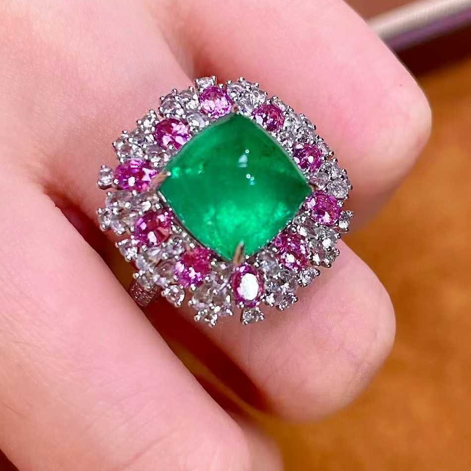 14k Gold 8.26 Ctw Natural Emerald & Sapphire Ring: Ref:231089178 // gold content:14k gold // ring size:7. 25us // // main gemstone:emerald // shape:sugar-loaf // carat weight:5. 46ct // color:green // treatment:natural // // adjacent gemstone 2 :