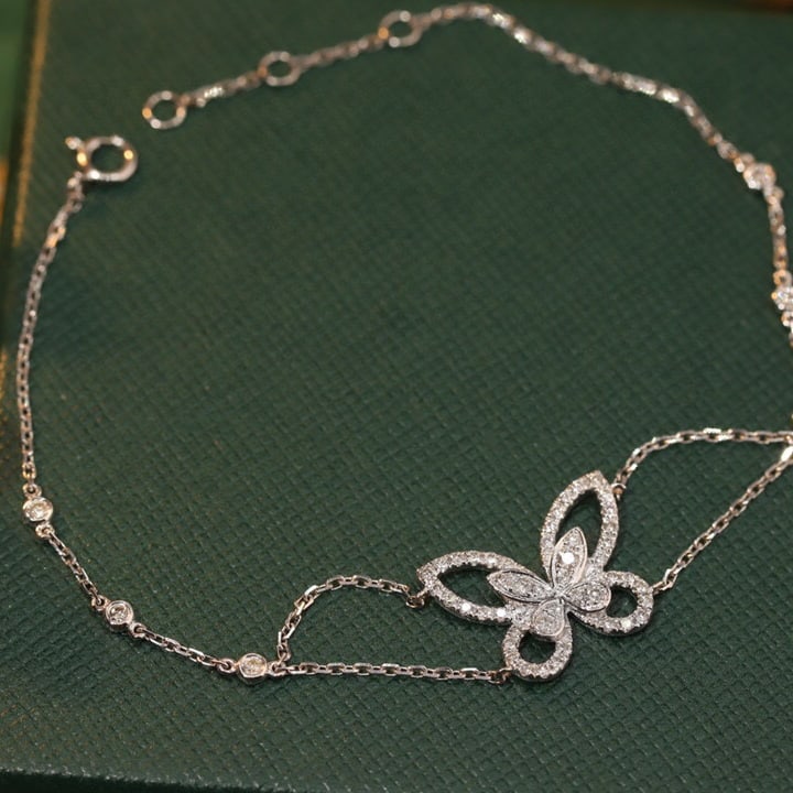 14k Gold 0.48 Ct Natural H Diamond & Butterfly Bracelet: Ref:231089231 // gold content:14k gold // main gemstone:diamond // shape:round // carat weight:0. 48ct // clarity grade:vs-si // color:h // treatment:natural // cut grade:g // Condition: New Low Esti