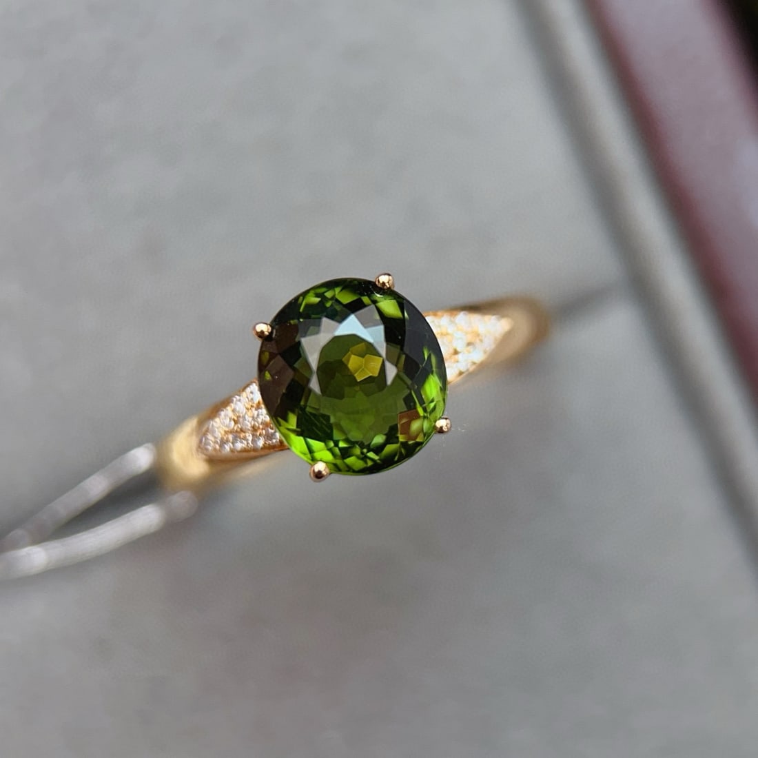 14k Gold 2.3 Ct Natural Tourmaline & Diamond Ring: Ref:231090145 // gold content:14k gold // ring size:7. 25us // // main gemstone:tourmaline // shape:oval // carat weight:2. 3ct // color:green // treatment:natural // // adjacent gemstone 2 : diamond
