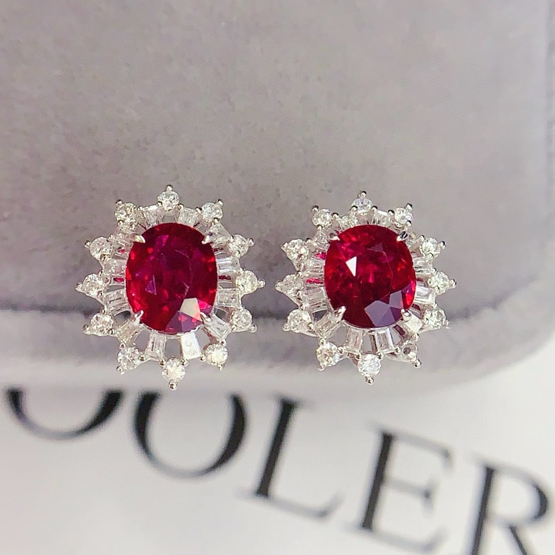 14k Gold 1.6 Ct Vivid Red Natural Ruby & Diamond Earrings: Ref:231090347 // gold content:14k gold // main gemstone:ruby // shape:oval // carat weight:1. 6ct // color:vivid red // treatment:natural // // adjacent gemstone 2 : diamond // number of stones:48 //