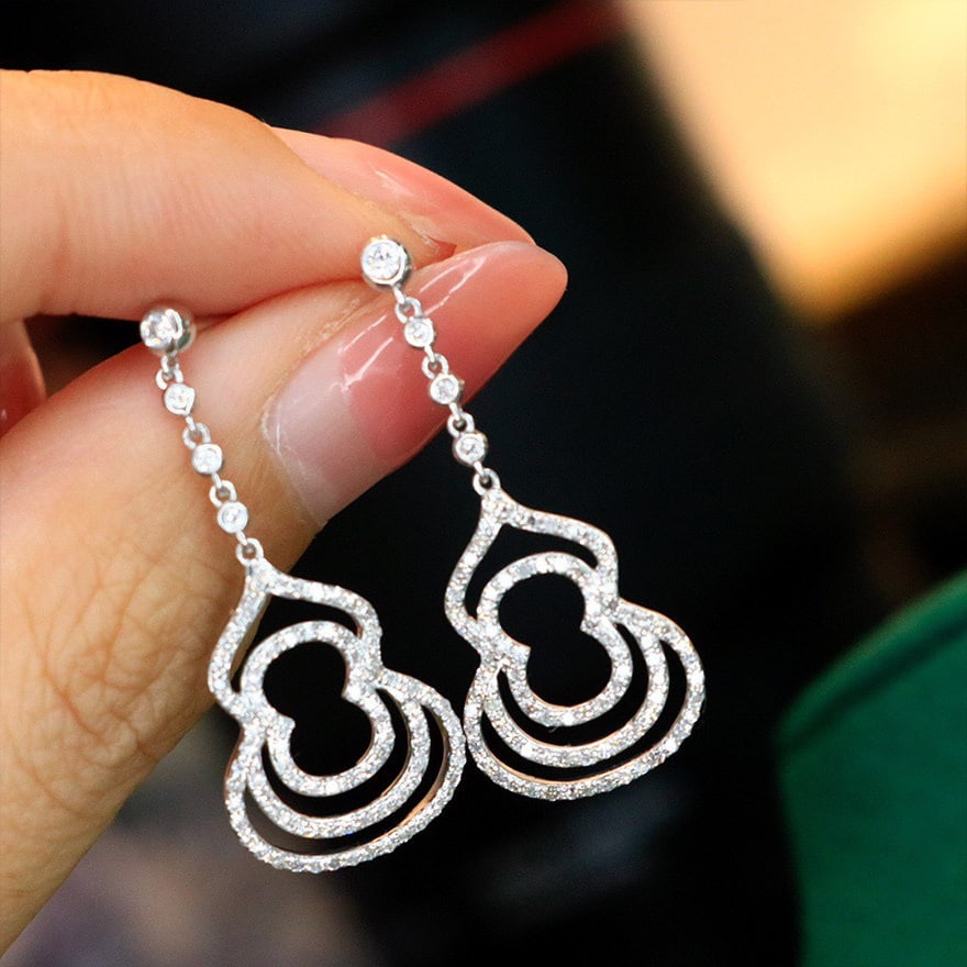 14K GOLD 0.60 CT NATURAL H DIAMOND EARRINGS: Ref:231101038 // Gold Content:14K Gold // Main Gemstone:Diamond // Shape:Round // Carat Weight:0.60ct // Clarity Grade:VS-SI // Color:H // Treatment:Natural // Cut Grade:G // Condition: NewLow