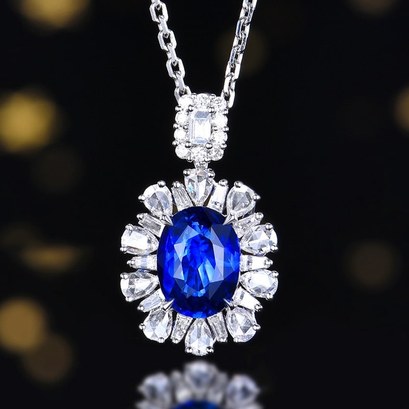 14K GOLD 2.50 CTW NATURAL SAPPHIRE & DIAMOND PENDANT( WITHOUT CHAIN ): Ref:231102250 // Gold Content:14K Gold // Main Gemstone:Sapphire // Shape:Oval // Carat Weight:1.87ct // Color:Royal blue // Treatment:Natural // // Adjacent Gemstone 2 : Diamond // Number of stones:3