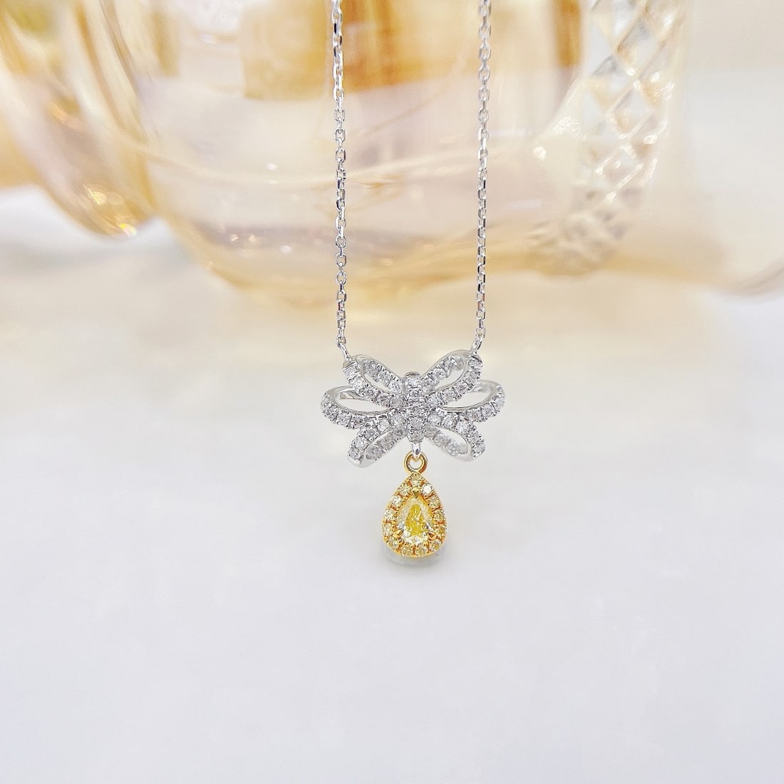 14K GOLD 0.40 CTW NATURAL YELLOW DIAMOND & DIAMOND NECKLACE: Ref:231102272 // Gold Content:14K Gold // Main Gemstone:Yellow Diamond // Shape:Pear // Carat Weight:0.14ct // Color:Yellow // Treatment:Natural // // Adjacent Gemstone 2 : Diamond // Shape:Round