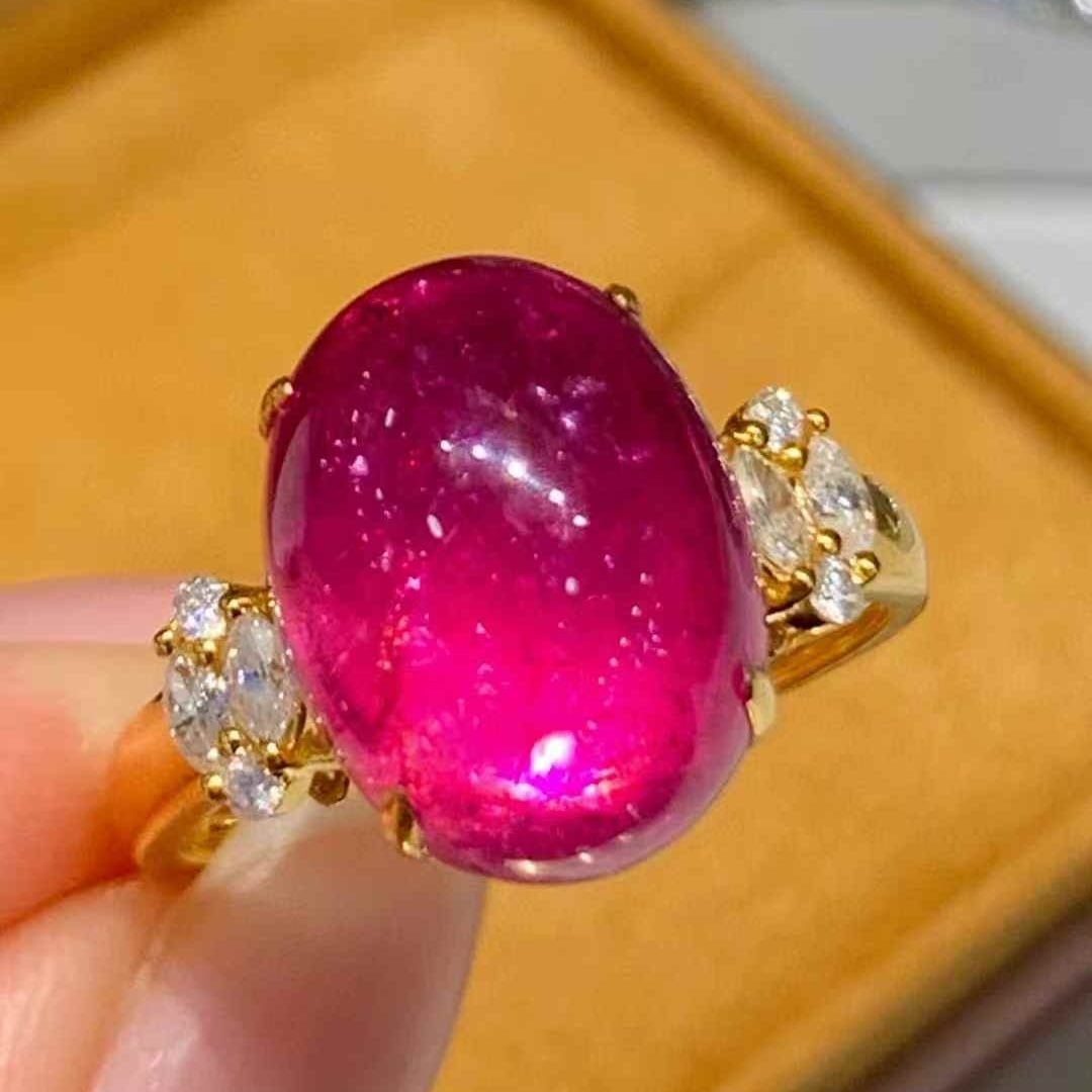 14k Gold 8.65 Ct Natural Tourmaline & Diamond Ring: Ref:231103178 // gold content:14k gold // ring size:7. 25us // // main gemstone:tourmaline // shape:oval // carat weight:8. 65ct // color:red // treatment:natural // // adjacent gemstone 2 :