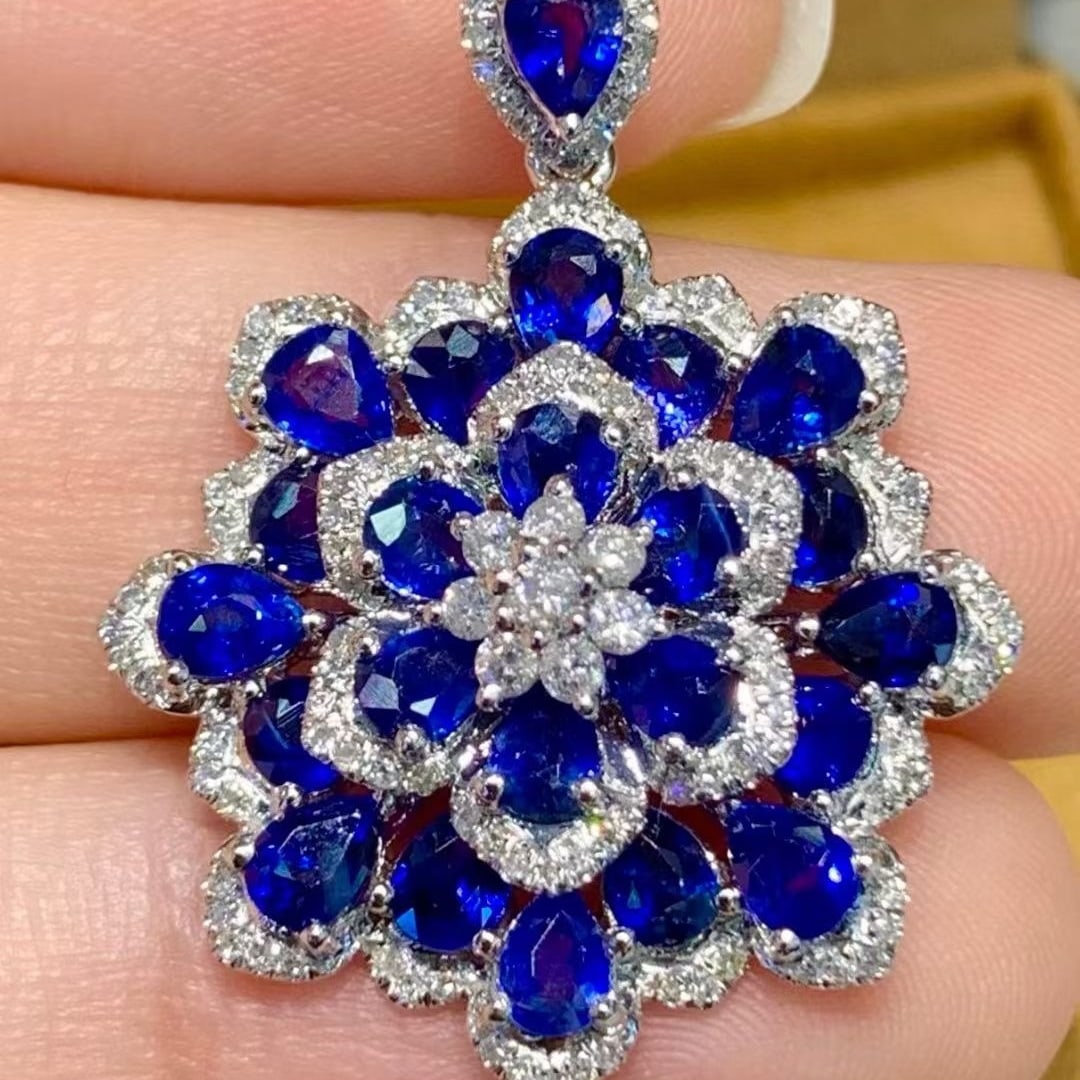 14k Gold 4.5 Ct Natural Sapphire & Diamond Pendant( Without Chain ): Ref:231103186 // gold content:14k gold // main gemstone:sapphire // shape:pear // carat weight:4. 5ct // color:royal blue // treatment:natural // // adjacent gemstone 2 : diamond // shape:round //