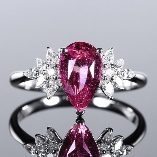 14k Gold 2.37 Ctw Natural Sapphire & Diamond Ring: Ref:231104003 // gold content:14k gold // ring size:7. 25us // // main gemstone:sapphire // shape:pear // carat weight:2. 06ct // color:pink // treatment:natural // // adjacent gemstone 2 :