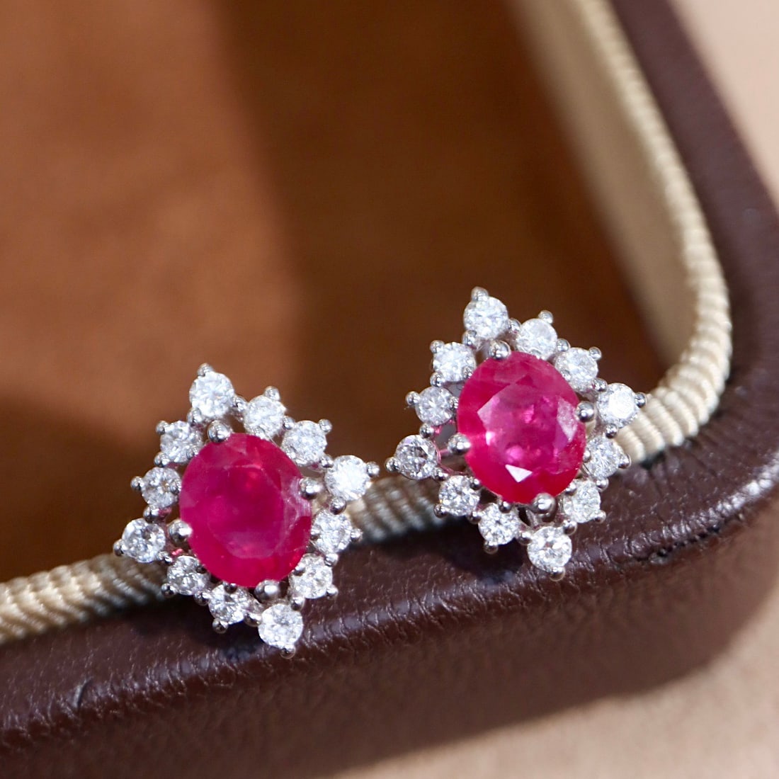 14k Gold 1.74 Ctw Natural Ruby & Diamond Earrings: Ref:231104099 // gold content:14k gold // main gemstone:ruby // shape:oval // carat weight:1. 34ct // color:red // treatment:natural // // adjacent gemstone 2 : diamond // shape:round // carat weight: