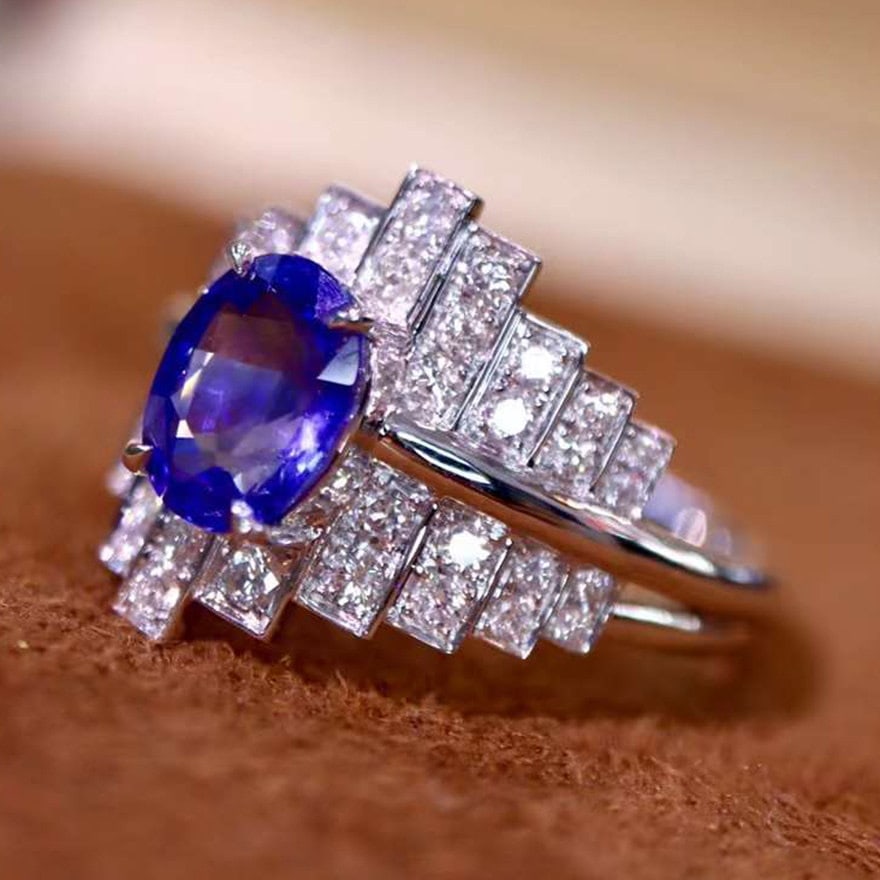 14k Gold 1.89 Ctw Natural Sapphire & Diamond Ring: Ref:231104265 // gold content:14k gold // ring size:7. 25us // // main gemstone:sapphire // shape:oval // carat weight:1. 47ct // color:blue // treatment:natural // // adjacent gemstone 2 :