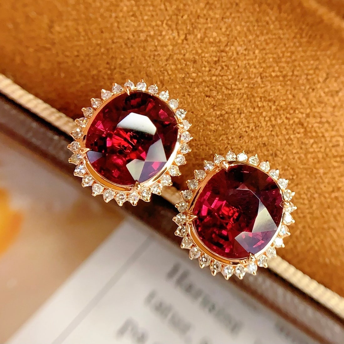 14k Gold 5.36 Ct Natural Tourmaline & Diamond Earrings: Ref:231104273 // gold content:14k gold // main gemstone:tourmaline // shape:oval // carat weight:5. 36ct // color:red // treatment:natural // // adjacent gemstone 2 : diamond // number of stones:56