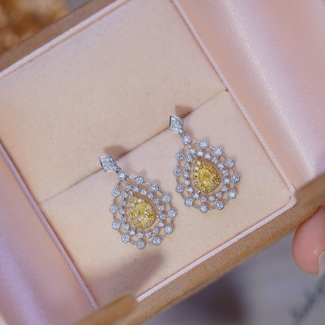 14k Gold 0.7 Ctw Natural Yellow Diamond & Diamond Earrings: Ref:231104305 // gold content:14k gold // main gemstone:yellow diamond // shape:pear // carat weight:0. 2ct // color:yellow // treatment:natural // // adjacent gemstone 2 : diamond // shape:round // c