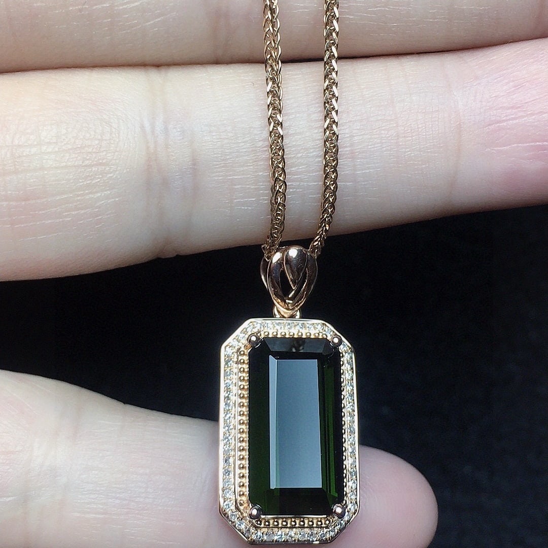 14k Gold 5.16 Ct Natural Tourmaline & Diamond Pendant( Without Chain ): Ref:231104422 // gold content:14k gold // main gemstone:tourmaline // shape:octagonal // carat weight:5. 16ct // color:green // treatment:natural // // adjacent gemstone 2 : diamond // number of
