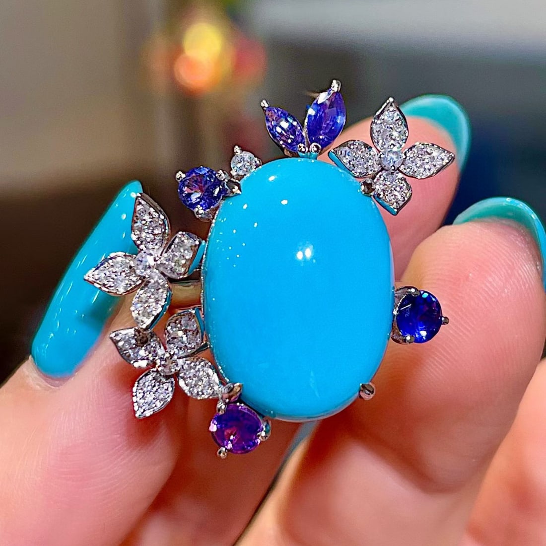 14k Gold 11.95 Ctw Natural Blue Turquoise & Sapphire Ring: Ref:231113099 // gold content:14k gold // ring size:7. 25us // // main gemstone:blue turquoise // shape:oval // carat weight:11. 10ct // color:blue // treatment:natural // // adjacent gemstone 2 :