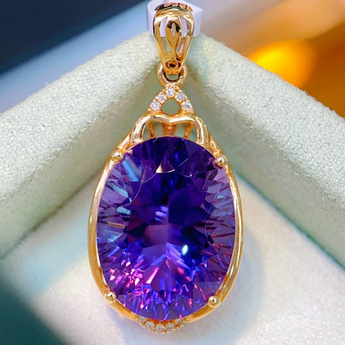 14k Gold 9.38 Ctw Natural Amethyst & Diamond Pendant( Without Chain ): Ref:231113102 // gold content:14k gold // main gemstone:amethyst // shape:oval // carat weight:9. 35ct // color:purple // treatment:natural // // adjacent gemstone 2 : diamond // number of stones:10 /