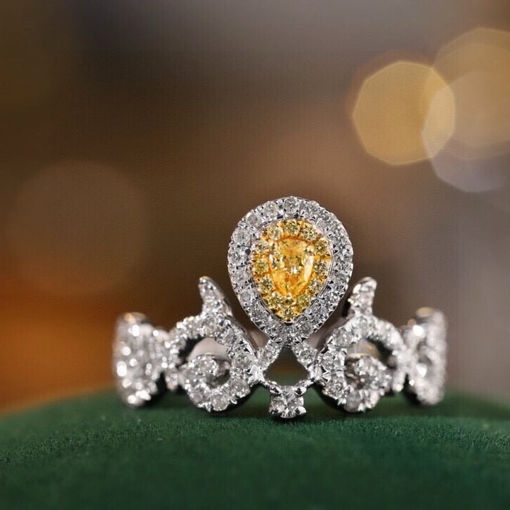 14k Gold 0.7 Ctw Natural Yellow Diamond & Diamond Ring: Ref:231113172 // gold content:14k gold // ring size:7. 25us // // main gemstone:yellow diamond // shape:pear // carat weight:0. 1ct // color:yellow // treatment:natural // // adjacent gemstone 2 :