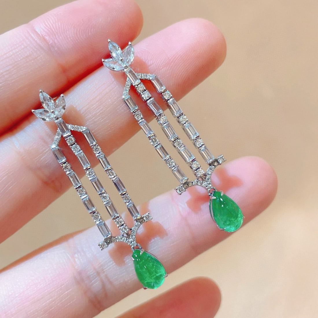 14k Gold 2.51 Ctw Natural Emerald & Diamond Earrings: Ref:231113203 // gold content:14k gold // main gemstone:emerald // shape:pear // carat weight:1. 99ct // color:green // treatment:natural // // adjacent gemstone 2 : diamond // shape:round // carat