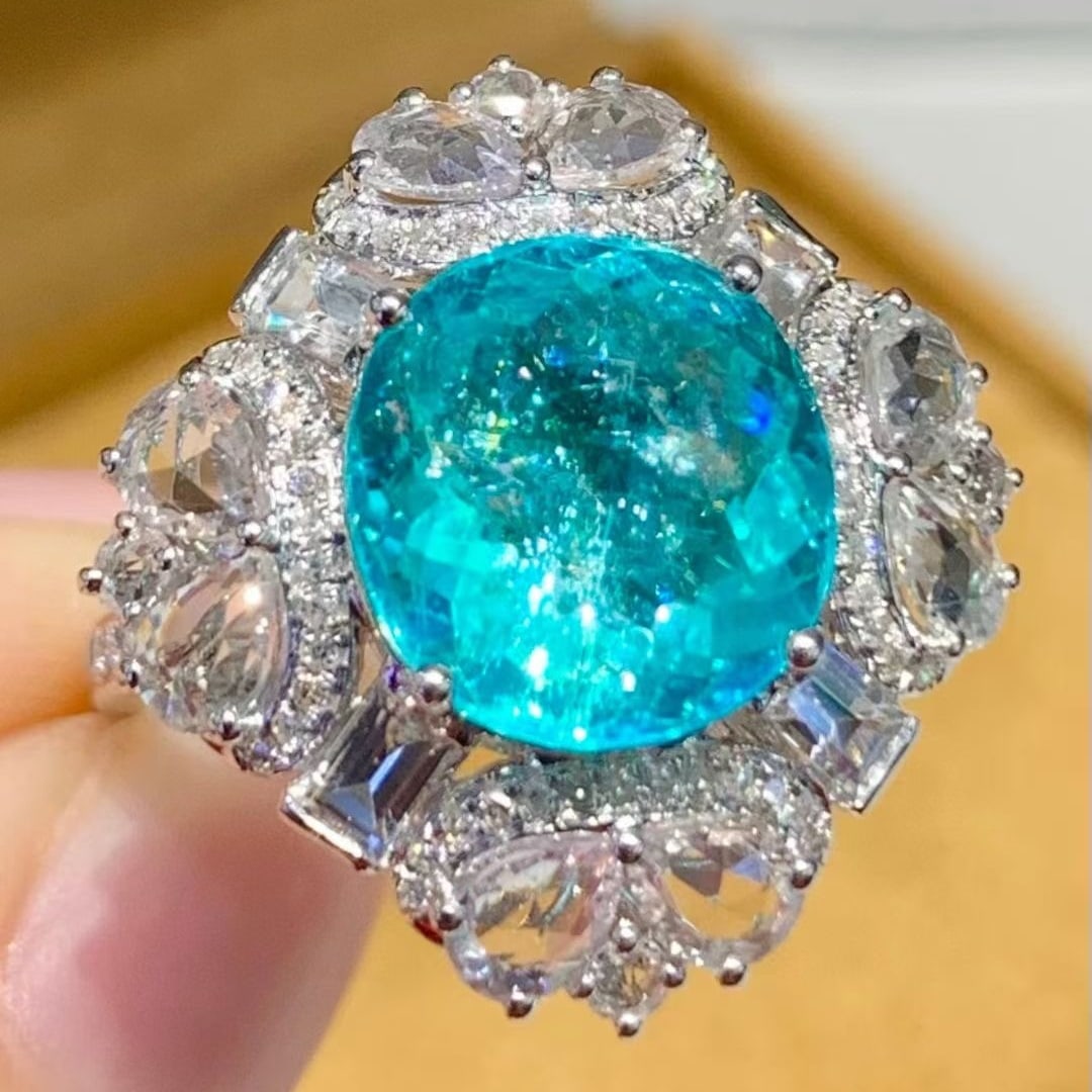 14k Gold 4.9 Ct Natural Paraiba Tourmaline & Diamond & Sapphire Ring: Ref:231113222 // gold content:14k gold // ring size:7. 25us // // main gemstone:paraiba tourmaline // shape:oval // carat weight:4. 9ct // color:blue // treatment:natural // // adjacent gemstone 2 : d