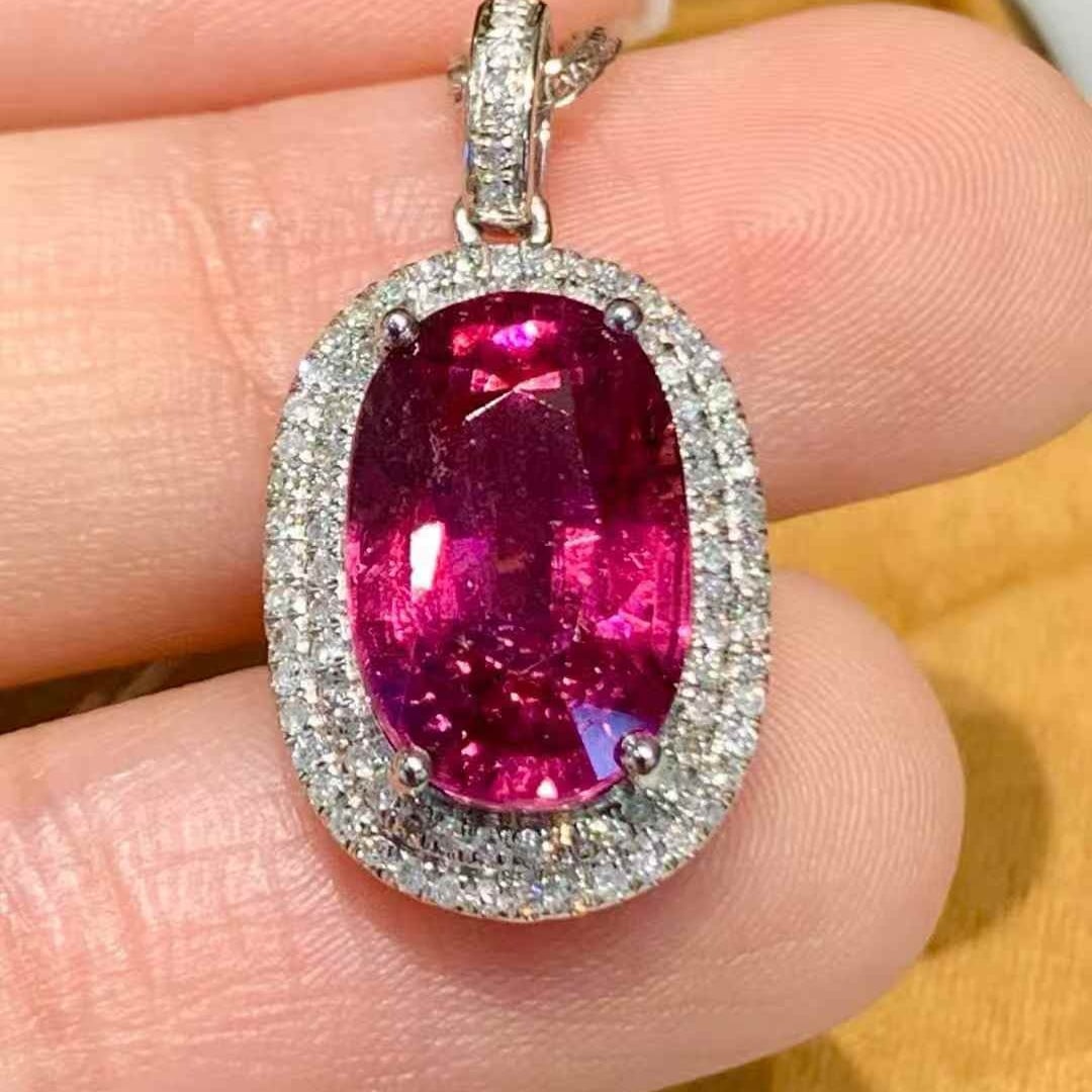 14k Gold 4.5 Ct Natural Tourmaline & Diamond Pendant( Without Chain ): Ref:231113229 // gold content:14k gold // main gemstone:tourmaline // shape:oval // carat weight:4. 5ct // color:red // treatment:natural // // adjacent gemstone 2 : diamond // shape:round // clarity