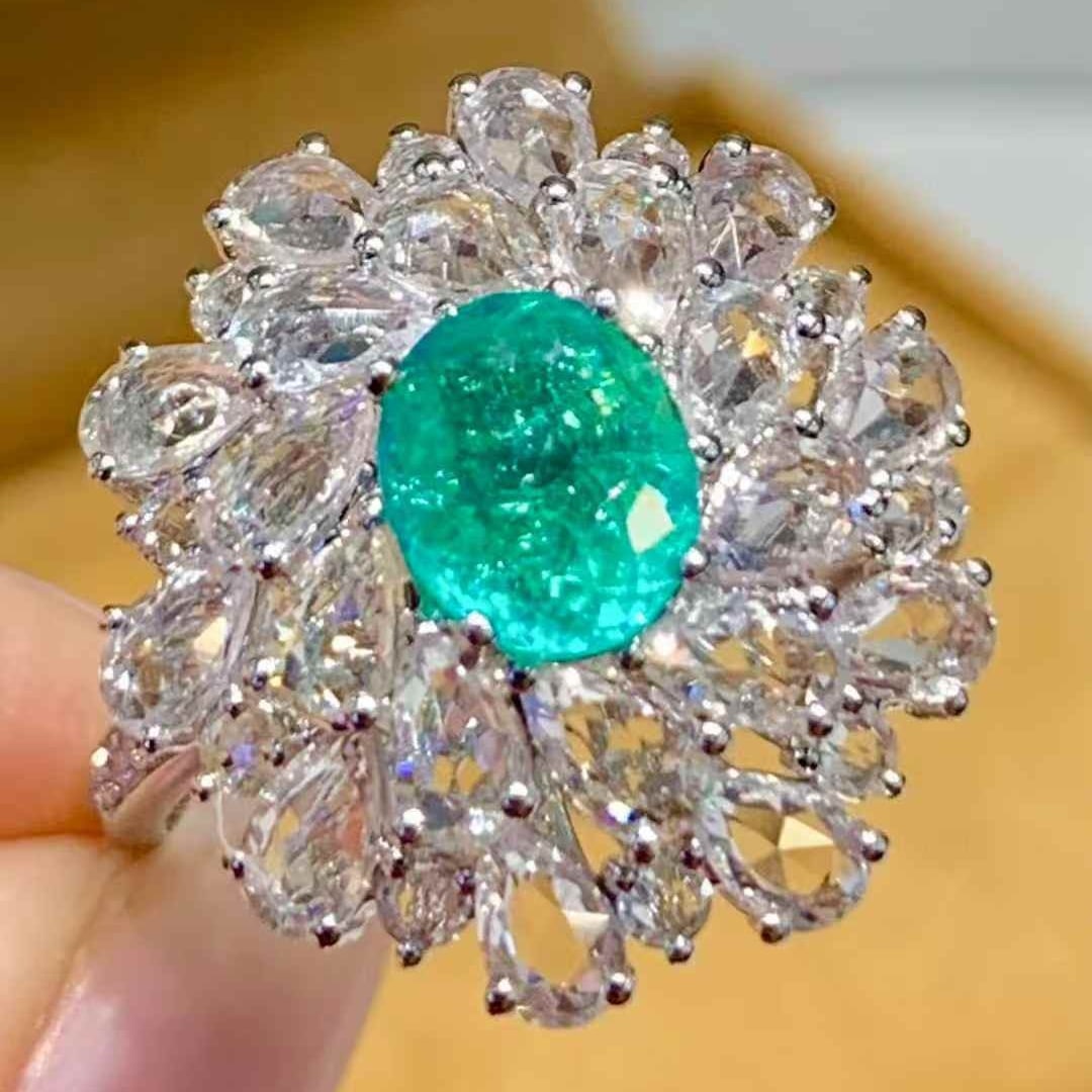 14k Gold 1.2 Ct Natural Paraiba Tourmaline & Sapphire & Diamond Ring: Ref:231113230 // gold content:14k gold // ring size:7. 25us // // main gemstone:paraiba tourmaline // shape:oval // carat weight:1. 2ct // color:bluish green // treatment:natural // // adjacent gemsto