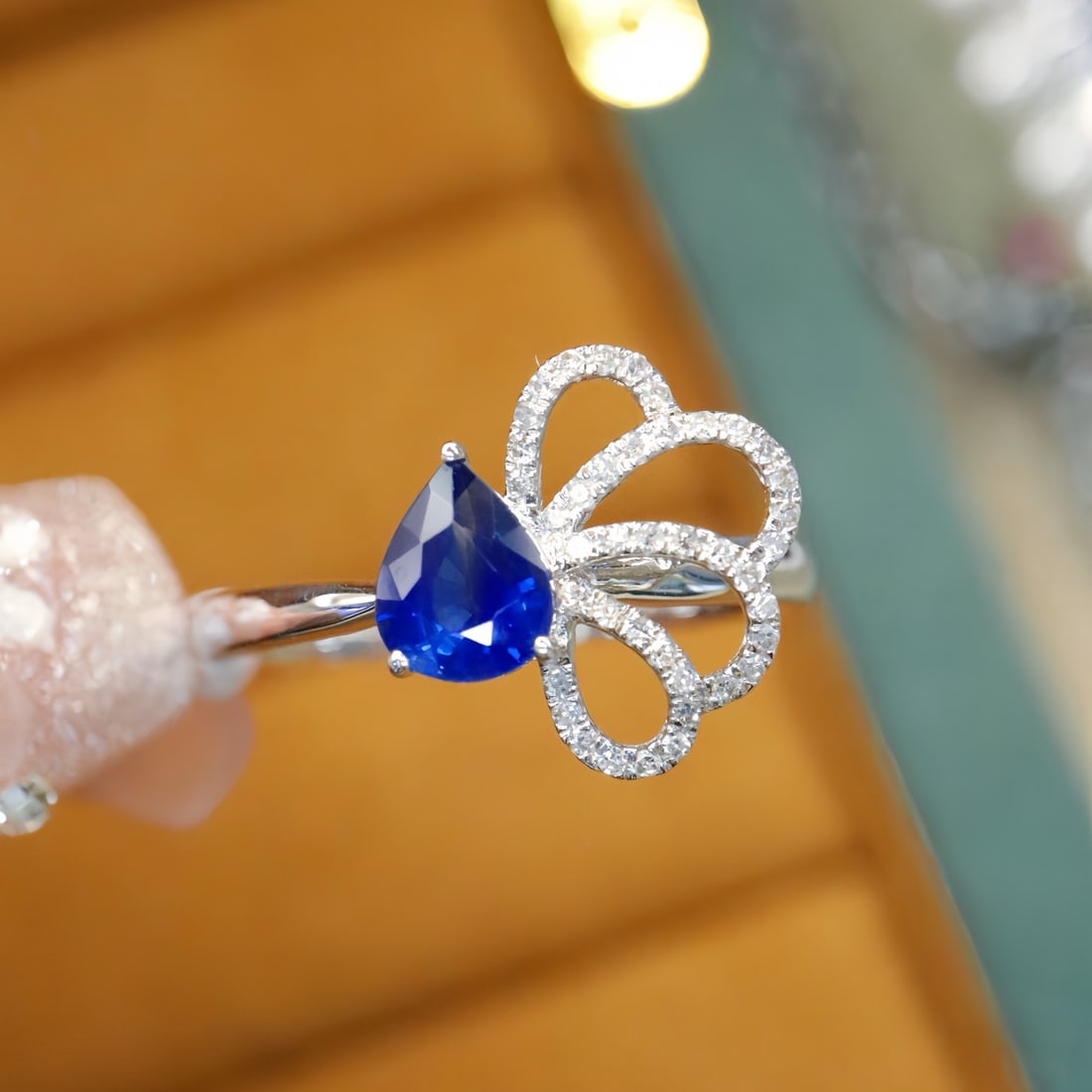 14k Gold 0.85 Ctw Natural Sapphire & Diamond Ring: Ref:231114156 // gold content:14k gold // ring size:7. 25us // // main gemstone:sapphire // shape:pear // carat weight:0. 73ct // color:royal blue // treatment:natural // // adjacent gemstone 2 :