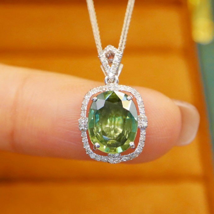 14k Gold 2.09 Ctw Natural Sapphire & Diamond Pendant( Without Chain ): Ref:231114171 // gold content:14k gold // main gemstone:sapphire // shape:oval // carat weight:1. 92ct // color:green // treatment:natural // // adjacent gemstone 2 : diamond // number of stones:56