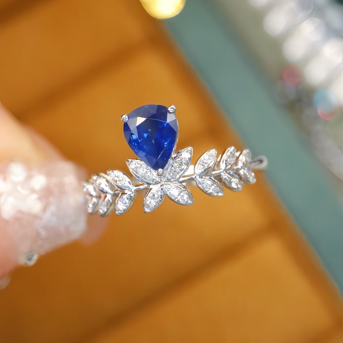 14k Gold 0.76 Ctw Natural Sapphire & Diamond Ring: Ref:231114178 // gold content:14k gold // ring size:7. 25us // // main gemstone:sapphire // shape:pear // carat weight:0. 68ct // color:blue // treatment:natural // // adjacent gemstone 2 :