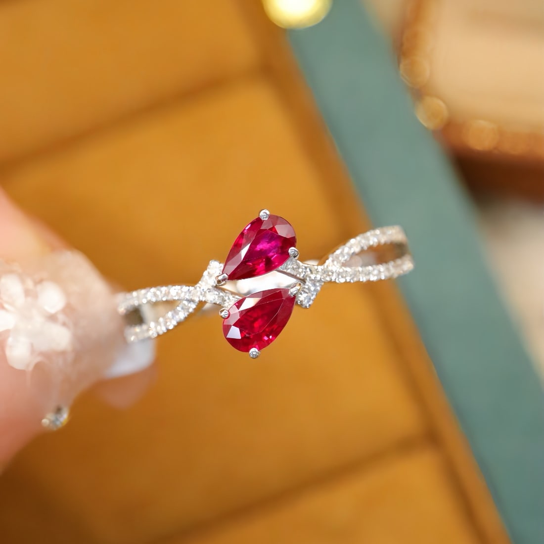 14k Gold 0.69 Ctw Natural Ruby & Diamond Ring: Ref:231114197 // gold content:14k gold // ring size:7. 25us // // main gemstone:ruby // shape:pear // carat weight:0. 55ct // color:red // treatment:natural // // adjacent gemstone 2 : diamond //