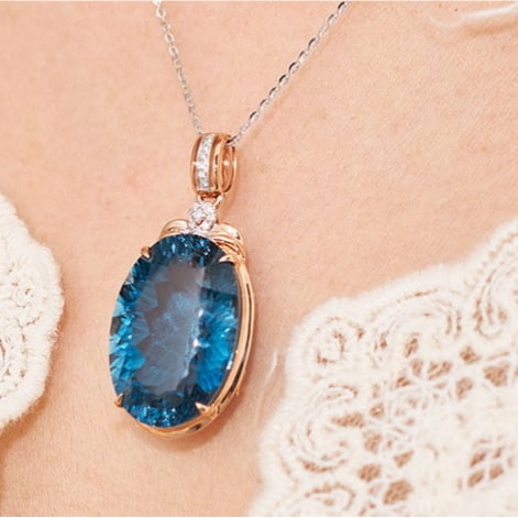 14k Gold 21.68 Ct Natural Topaz & Diamond Pendant( Without Chain ): Ref:231114248 // gold content:14k gold // main gemstone:topaz // shape:oval // carat weight:21. 68ct // color:blue // treatment:natural // // adjacent gemstone 2 : diamond // shape:round // clarity gr