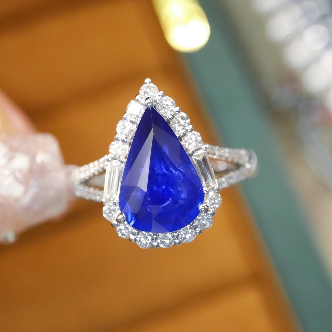14k Gold 2.60 Ctw Natural Sapphire & Diamond Ring: Ref:231114396 // gold content:14k gold // ring size:7. 25us // // main gemstone:sapphire // shape:pear // carat weight:2. 15ct // color:blue // treatment:natural // // adjacent gemstone 2 :