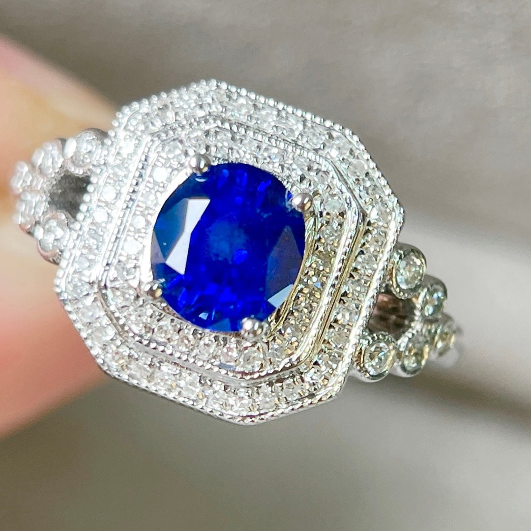 14k Gold 1.29 Ctw Vivid Blue Natural Sapphire & Diamond Ring: Ref:231114441 // gold content:14k gold // ring size:7. 25us // // main gemstone:sapphire // shape:oval // carat weight:1. 01ct // color:vivid blue // treatment:natural // // adjacent gemstone 2 :