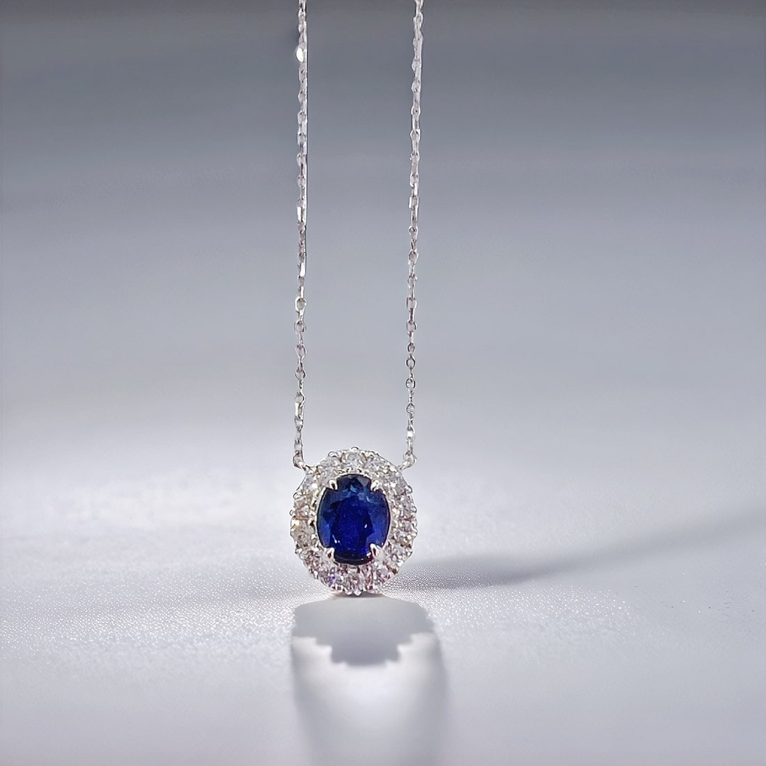 Express Shipping 18k Gold 0.80 Ctw Natural Sapphire & Diamond Necklace: Ref:21023 // gold content:18k gold // main gemstone:sapphire // shape:oval // carat weight:0. 62ct // color:blue // treatment:natural // // adjacent gemstone 2 : diamond // shape:round // carat