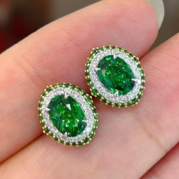 14k Gold 2.2 Ct Natural Tsavorite & Diamond Earrings: Ref:231105051 // gold content:14k gold // main gemstone:tsavorite // shape:oval // carat weight:2. 2ct // color:green // treatment:natural // // adjacent gemstone 2 : diamond // shape:round // clarity