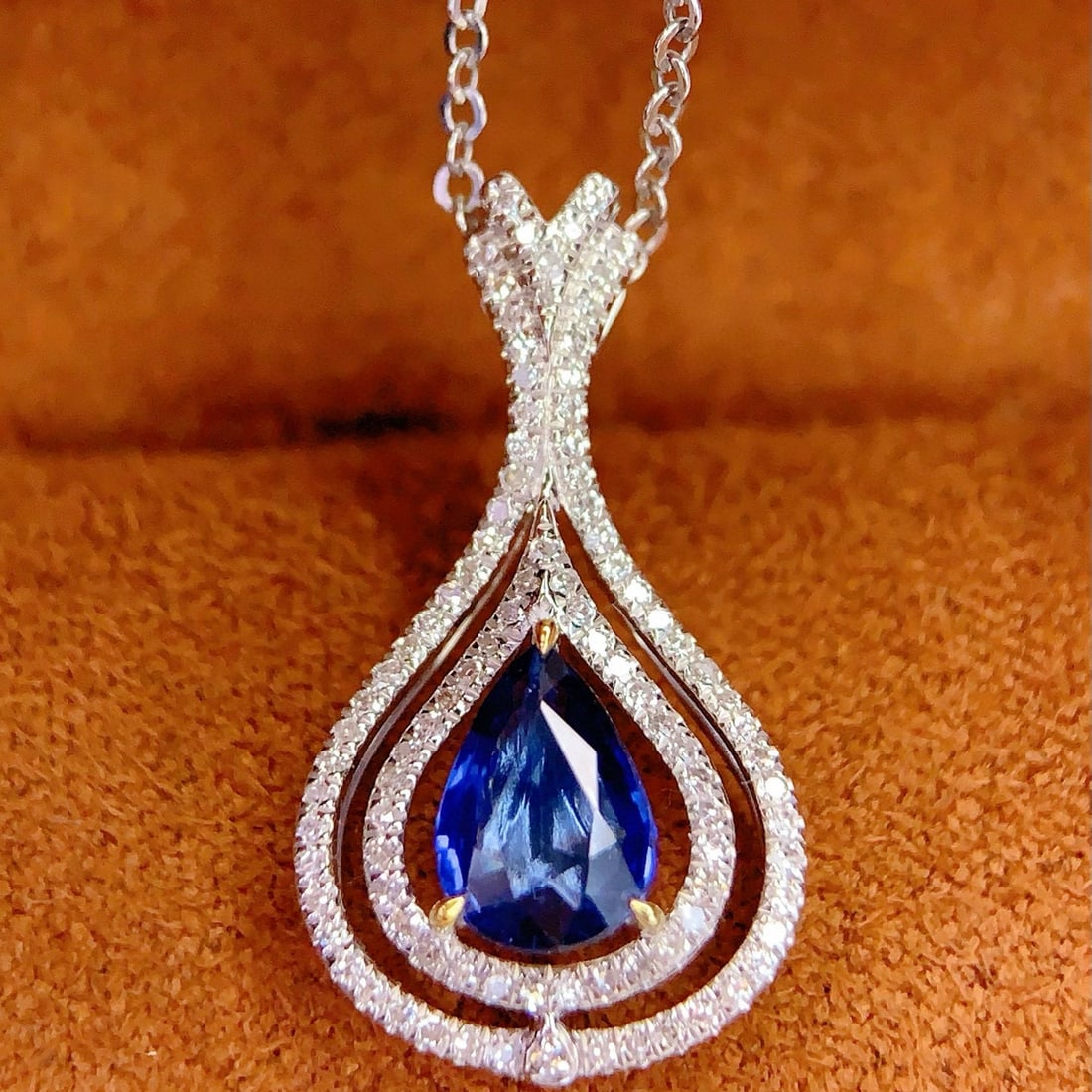 14k Gold 1.1 Ct Natural Sapphire & Diamond Pendant( Without Chain ): Ref:231105150 // gold content:14k gold // main gemstone:sapphire // shape:pear // carat weight:1. 1ct // color:blue // treatment:natural // // adjacent gemstone 2 : diamond // number of stones:58