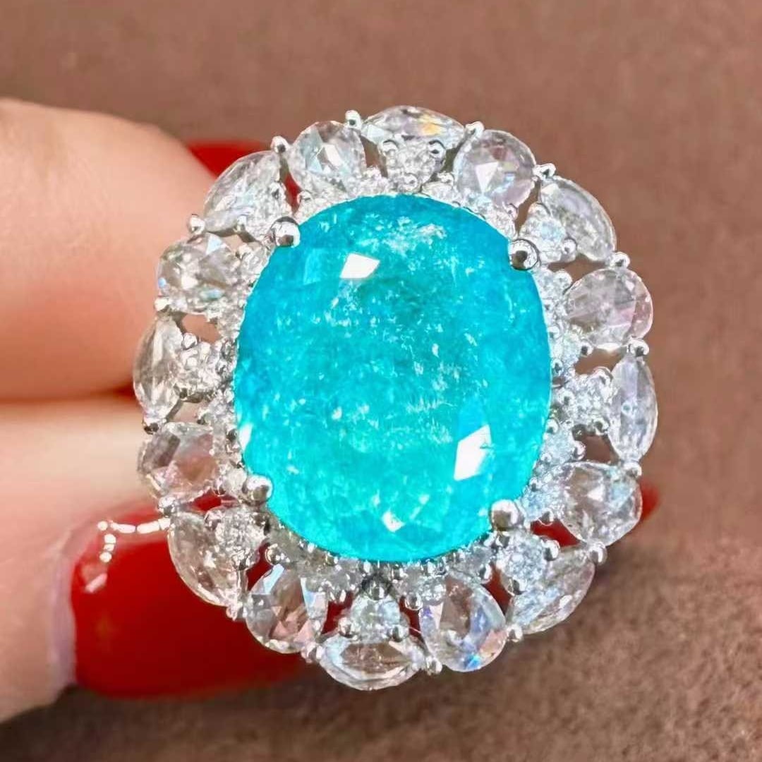 14k Gold 5.53 Ctw Natural Paraiba Tourmaline & Diamond Ring/pendant( Without Chain ): Ref:231105176 // gold content:14k gold // ring size:7. 25us // // main gemstone:paraiba tourmaline // shape:oval // carat weight:4. 51ct // color:neon blue // treatment:natural // // adjacent gemstone