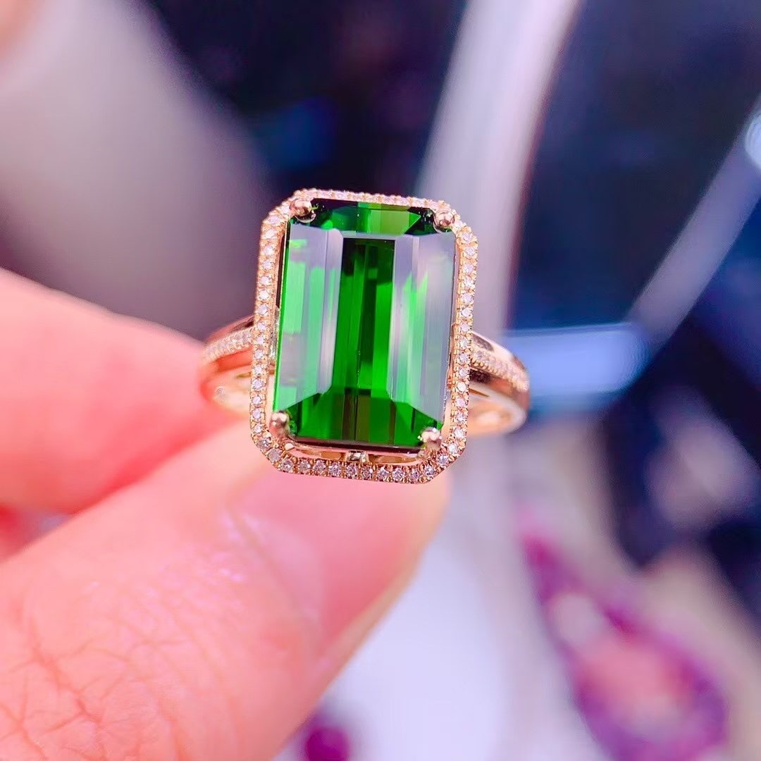 14k Gold 7.5 Ct Natural Tourmaline & Diamond Ring: Ref:231105180 // gold content:14k gold // ring size:7. 25us // // main gemstone:tourmaline // shape:octagonal // carat weight:7. 5ct // color:green // treatment:natural // // adjacent gemstone 2 :