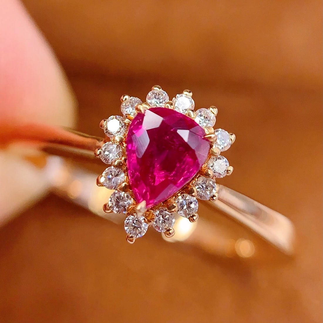 14k Gold 0.55 Ct Natural Ruby & Diamond Ring: Ref:231106191 // gold content:14k gold // ring size:7. 25us // // main gemstone:ruby // shape:pear // carat weight:0. 55ct // color:red // treatment:natural // // adjacent gemstone 2 : diamond //