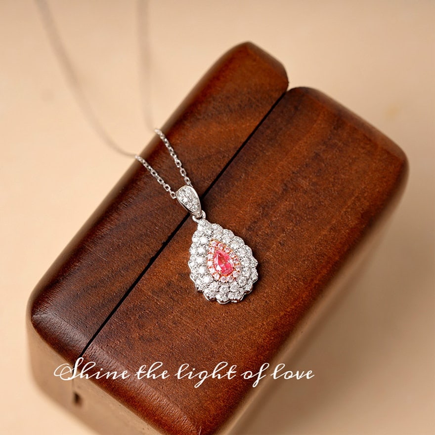 14k Gold 0.60 Ctw Natural Pink Diamond & Diamond Necklace: Ref:231106277 // gold content:14k gold // main gemstone:pink diamond // shape:pear // carat weight:0. 15ct // color:pink // treatment:natural // // adjacent gemstone 2 : diamond // shape:round //
