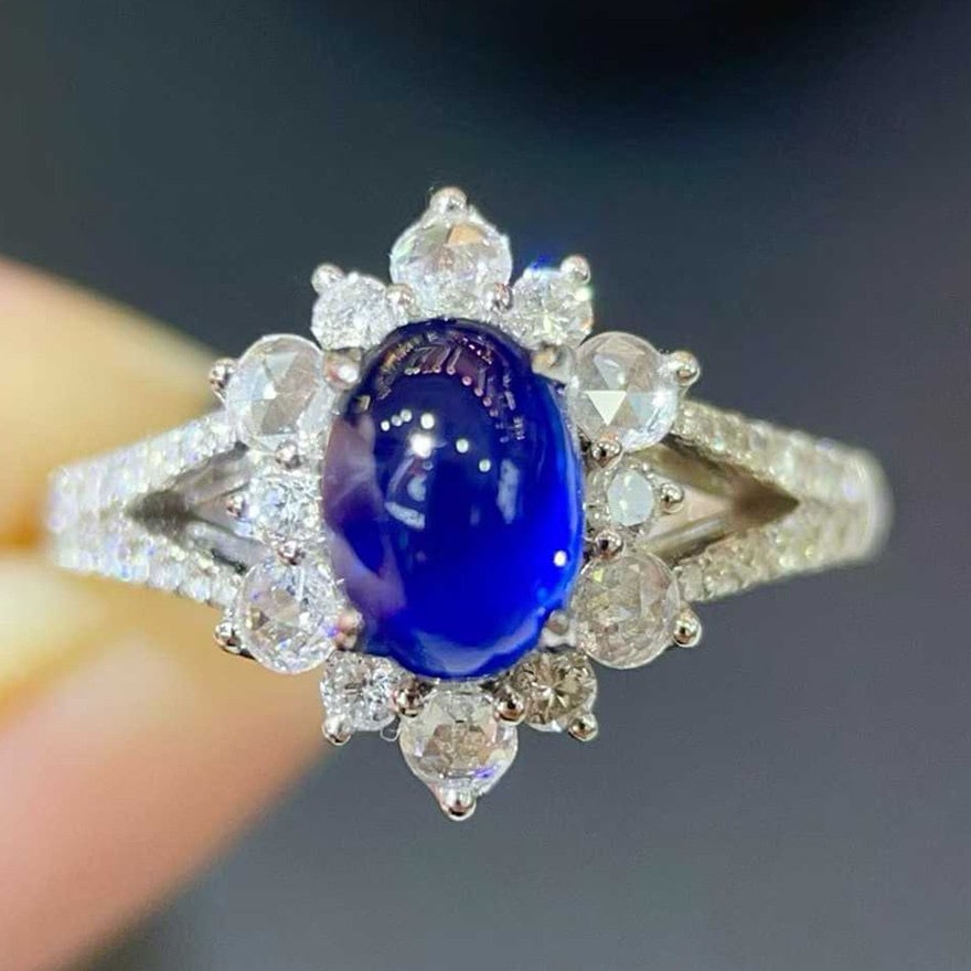 14k Gold 1.84 Ctw Natural Sapphire & Diamond Ring: Ref:231106282 // gold content:14k gold // ring size:7. 25us // // main gemstone:sapphire // shape:oval // carat weight:1. 43ct // color:blue // treatment:natural // // adjacent gemstone 2 :