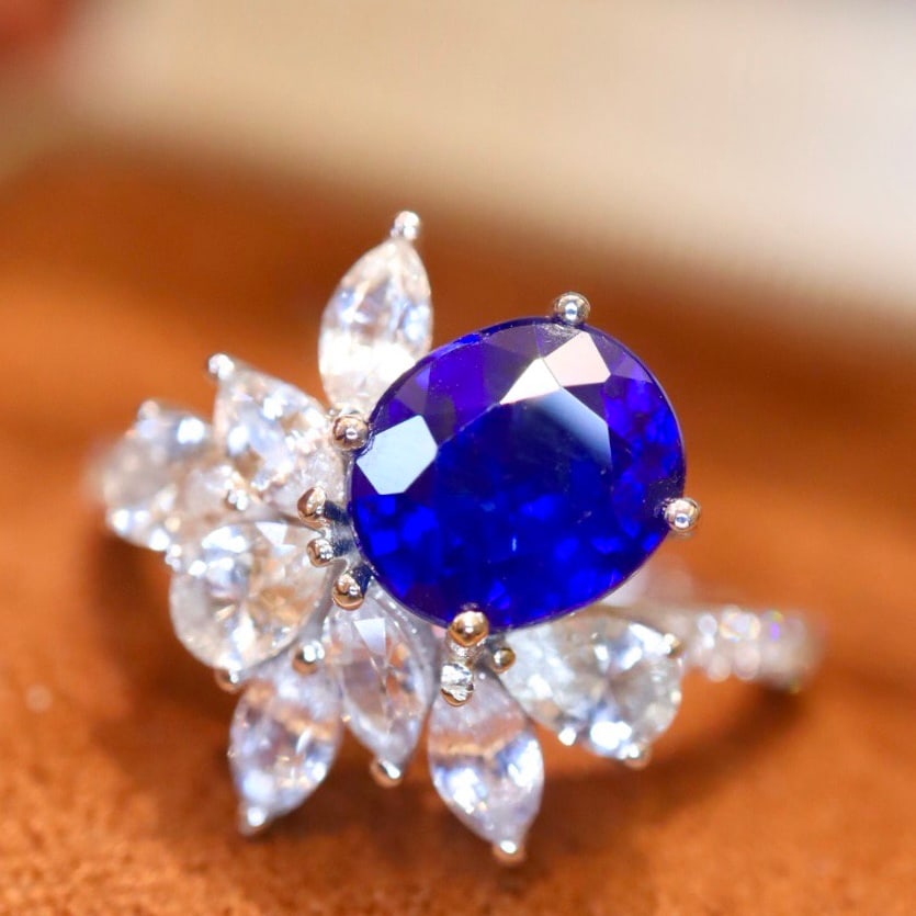 14k Gold 2.30 Ctw Natural Sapphire & Diamond Ring: Ref:231106309 // gold content:14k gold // ring size:7. 25us // // main gemstone:sapphire // shape:oval // carat weight:2. 15ct // color:royal blue // treatment:natural // // adjacent gemstone 2 :