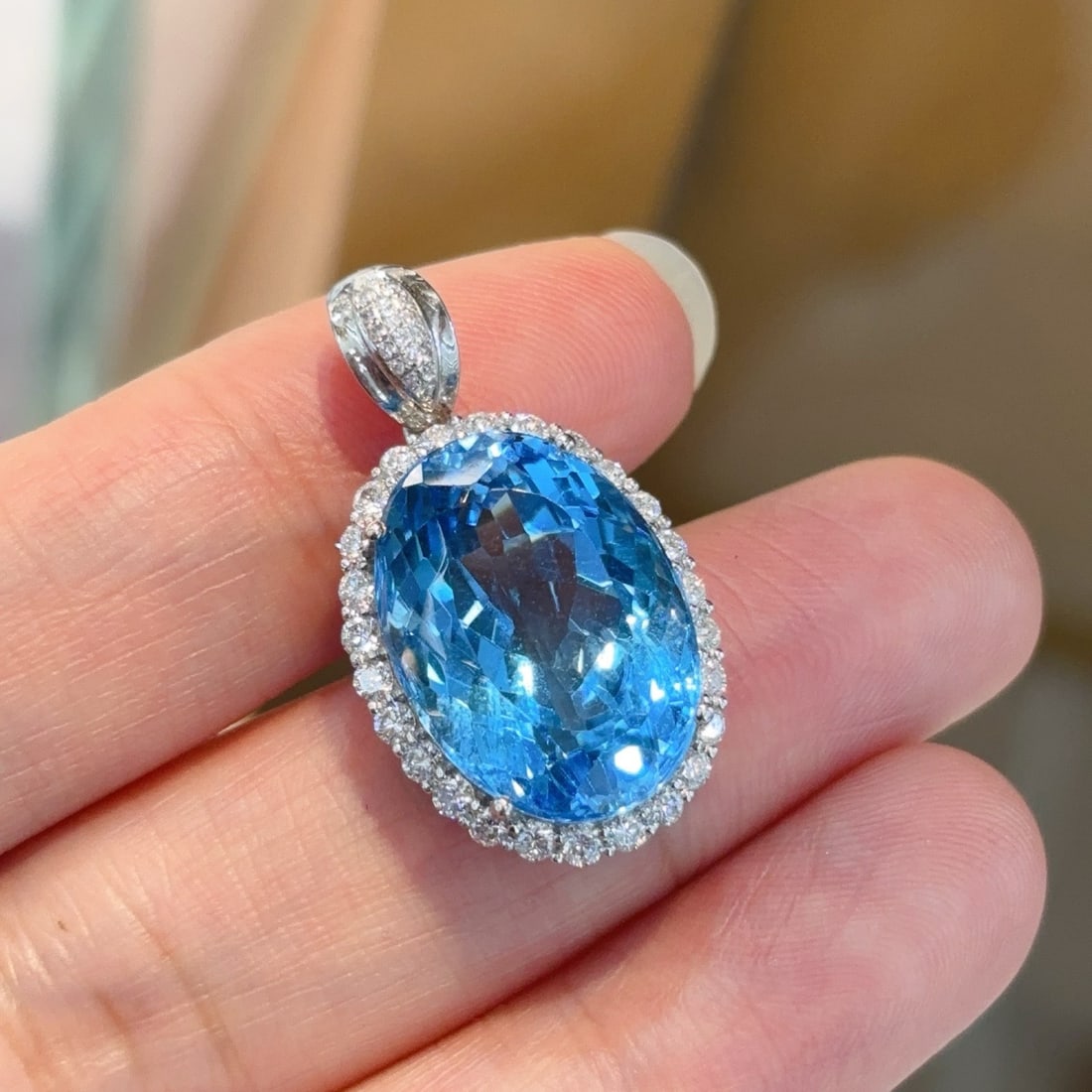 14k Gold 18.18 Ctw Natural Topaz & Diamond Pendant( Without Chain ): Ref:231106357 // gold content:14k gold // main gemstone:topaz // shape:oval // carat weight:17. 2ct // color:blue // treatment:natural // // adjacent gemstone 2 : diamond // shape:round // carat weigh
