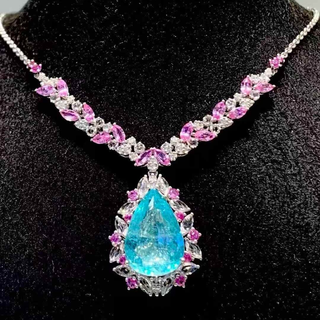 14k Gold 6.19 Ct Natural Paraiba Tourmaline & Diamond Necklace: Ref:231115016 // gold content:14k gold // main gemstone:paraiba tourmaline // shape:pear // carat weight:6. 19ct // color:blue // treatment:natural // // adjacent gemstone 2 : diamond // shape:round /