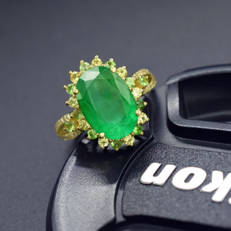 14k Gold 3.20 Ctw Natural Emerald & Sapphire Ring: Ref:231115029 // gold content:14k gold // ring size:7. 25us // // main gemstone:emerald // shape:oval // carat weight:3. 01ct // color:green // treatment:natural // // adjacent gemstone 2 :