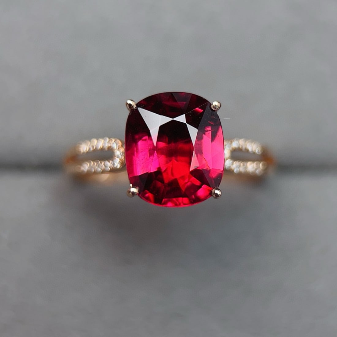 14k Gold 2.61 Ctw Natural Tourmaline & Diamond Ring: Ref:231115069 // gold content:14k gold // ring size:7. 25us // // main gemstone:tourmaline // shape:cushion // carat weight:2. 55ct // color:red // treatment:natural // // adjacent gemstone 2 :